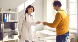 doctor giving a referral to a patient